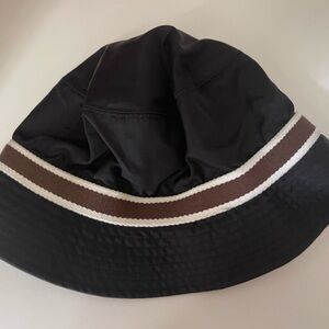 Coach black rain hat. See xl. Seems smaller